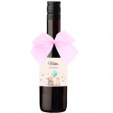 Botella de vino pequeña con lazo rosa y adhesivo personalizado para bautizo