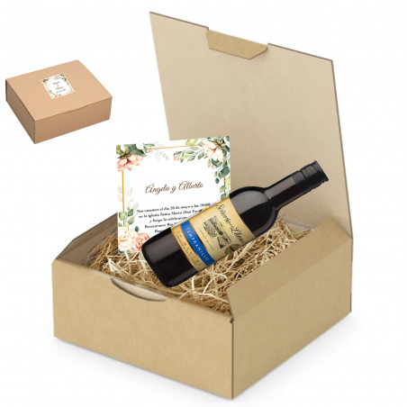 Botella de vino con tarjeta personalizada en caja de presentación