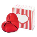 Perfumador recargable en forma de corazón rojo presentado en bolsa con adhesivo de frase de agradecimiento