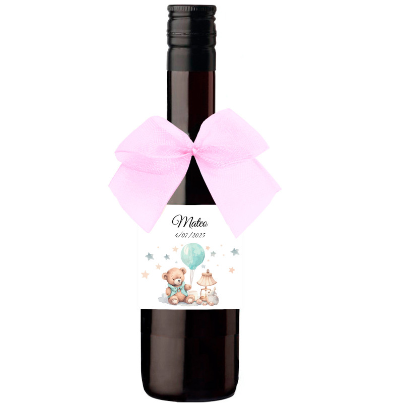 Botella de vino pequeña con lazo rosa y adhesivo personalizado para bautizo