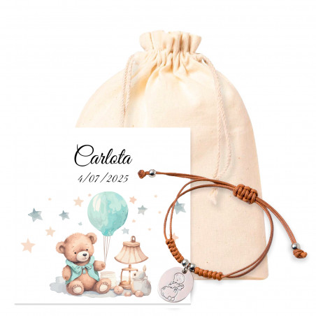 Pulsera angelito con tarjeta personalizada en bolsa de tela para detalles bautizo