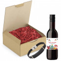 Vino tinto con adhesivo personalizado navideño y pulsera de acero presentado en caja para detalles